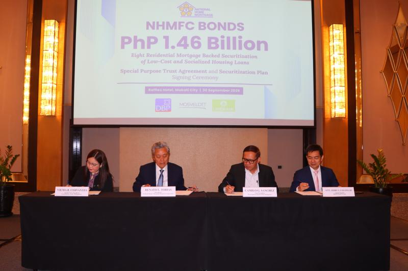 (L-R) LBP Senior Vice President Vilma Cervantes, NHMFC President Renato L. Tobias, DBP Vice-President Camilo Sanchez, and MOSVELDTT Law Offices Senior Partner Atty. Jerry S. Coloma led the Signing Ceremony of the NHMFC Bonds 8th Residential Mortgage-Backed Securities valued at  Php1.465 billion.